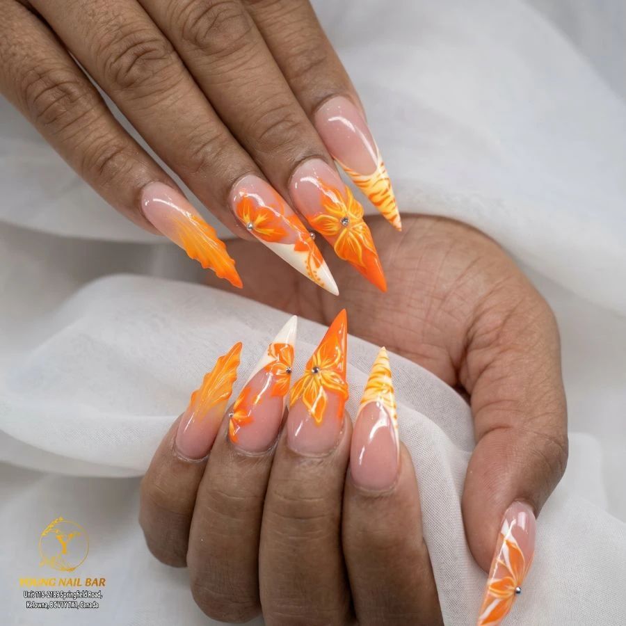 Orange hand-painted nail art